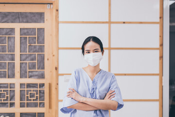 Patient woman wearing face mask protect coronavirus or covid-19 at hospital,Coronavirus protection mask