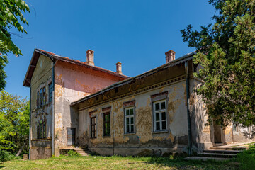 Fototapeta na wymiar Jarkovci, Serbia - June 05, 2021: The summer house Pejacevic was built at the end of the 19th century. Today it is a village primary school