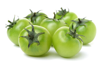 Green tomatoes on white background