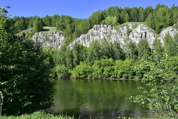 Fototapeta na wymiar Mount Podkamennaya on the right bank of the Sylva River