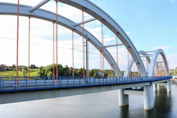 DABROWKA ,POLAND - JUNE 01, 2021: Bridges - railway and car ones on Lake Mucharskie,
