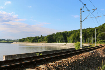 Obraz premium Railway tracks and beautiful mountain landscapes all around.