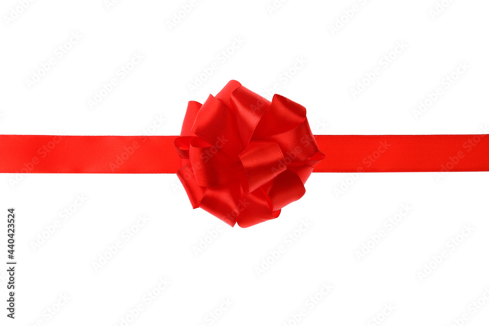 Wall mural Red ribbon with bow on white background. Festive decoration