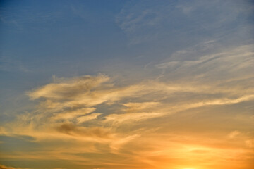 Sunset sky with clouds in the evening in summer