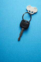 car shape  keyring   on blue background