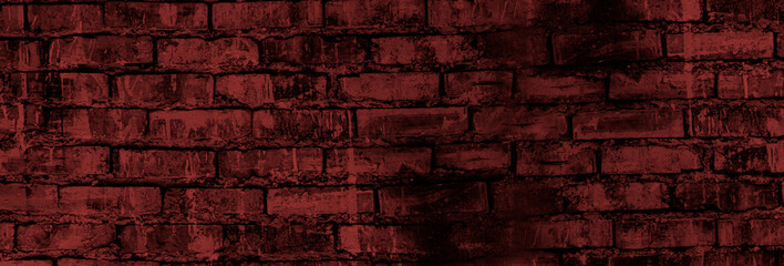 Naklejka na ściany i meble brick grunge background. an old brick wall. A dark gray stone wall. Crumbling brickwork. A weathered stone wall.