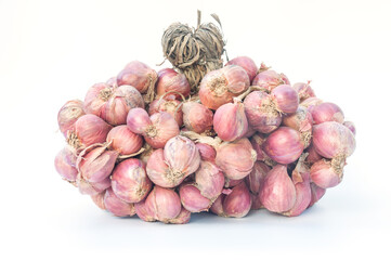 Shallot onions in a group isolated on a white background
.Shallots are ingredients in Thai curry.Shallots are Thai food and Thai herbs.