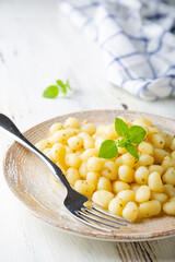 Gnocchi with olive oil, garlic and basil