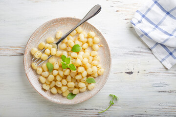 Gnocchi with olive oil, garlic and basil