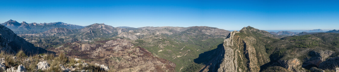 Fototapeta na wymiar sunny day and scenic mountain panorama in spain
