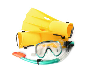 Pair of yellow flippers and mask on white background, top view © New Africa