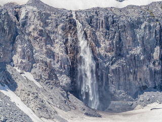 Waterfall on the cliff of Mount Rainier seen from Glacier Point at Paradise