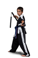 8 year old boy wearing a black martial arts kimono doing martial arts poses on a white background.