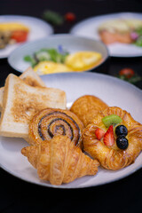 delicious breakfast on black background,top view