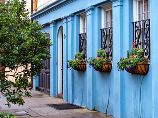 Fototapeta na wymiar Historic blue house on rainbow row, Charleston, SC