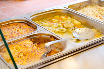 Selective focus shot of served food at a buffet