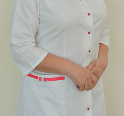 doctor or nurse in a white medical coat 