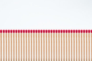 matches stacked in a row on a white background
