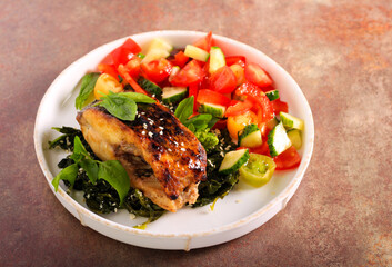 Spicy glazed mackerel fish with spinach