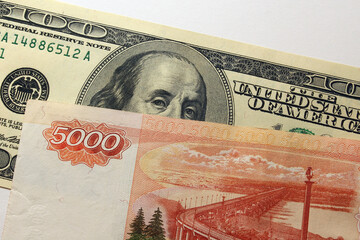Money of different values on a white background