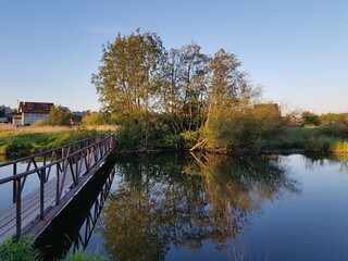 Old pedestrian bridge over the river