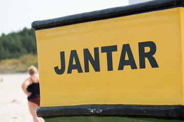 Inscription 'Jantar' on the wooden fishing boat, Poland.