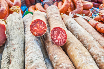Sausage in a market consisting of red chorizo and Iberian salami and delicious typical Spanish...