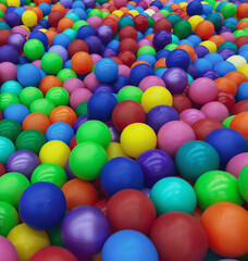 Fototapeta na wymiar Bright multi-colored balls for the pool for childrens games.Toys for children,entertainment for kids.Use in catalogs of childrens stores,advertising entertainment centers.Bright multi-color background