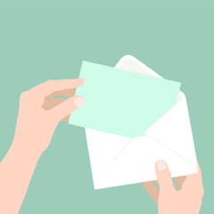 vector illustration of an envelope in female hands with a blue postcard on a dark blue background