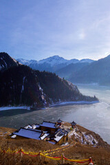 Buddhist temple, Tian Chi, Heaven Lake, Xinjiang, China, winter, with frozen lake