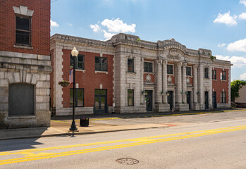 Abandoned building of the B and O railway station in Grafton West Virginia with the corner of the Willard Hotel