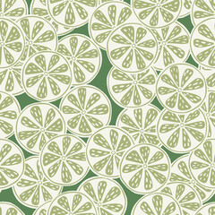 Random decorative seamless pattern with doodle lime slice silhouettes. Pastel colors. Natural organic food print.