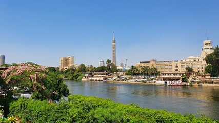 Fototapeta na wymiar Giza tower with Nile river