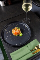 Salmon tartare with avocado, spring onion,tomato and caviar