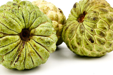 Sugar apple, custard apple, Annona, sweetsop (Cherimoya) isolate on white background. Fruit Properties Lower Cholesterol Levels concept