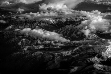 Snow mountains under clouds