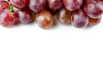 bunch of ripe and juicy red grapes isolated on white background