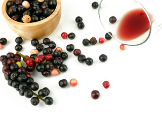Antidesma puncticulatum Miq, Thai Blueberry Fruit (Mamao) isolated on white background.Can be extracted into medicine and wine Growing in the Northeast of Thailand.