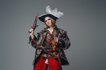 Woman corsair captain with hat and handgun
