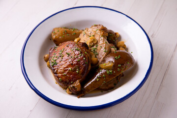 Pork loin cooked with pears and hazelnuts. Traditional Spanish tapa.