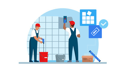 Professional tilers installing tiles on a wall