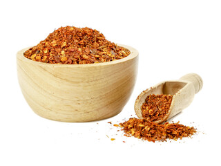 Pile crushed red pepper, Cayenne pepper, dried chili flakes isolated on white background