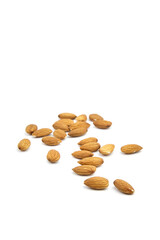 Almond nuts isolated on white background. Heap of scattered almonds