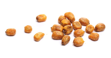 Fried salty corn grains isolated on white background 