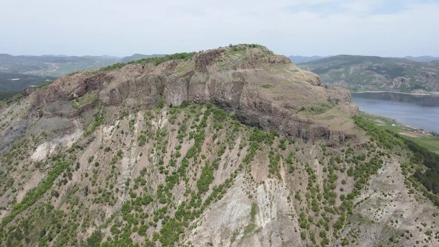 Aerial view of Studen Kladenets Reservoir and ruins of Monyak fortress, Kardzhali Region, Bulgaria