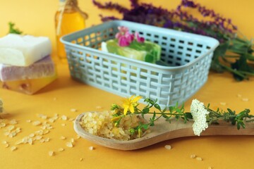 Healing herbs, natural soap, salt on a bright background, spa concept, body care, alternative medicine, home cosmetics preparation