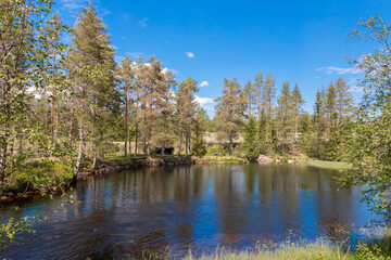 Swedish river landscape invites you to linger on a sunny summer day