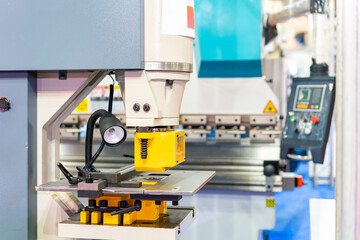 punch die or shear set on table semi automatic hydraulic press machine for forming cutting shearing notching punching or hole making of metal sheet in manufacturing process in industrial
