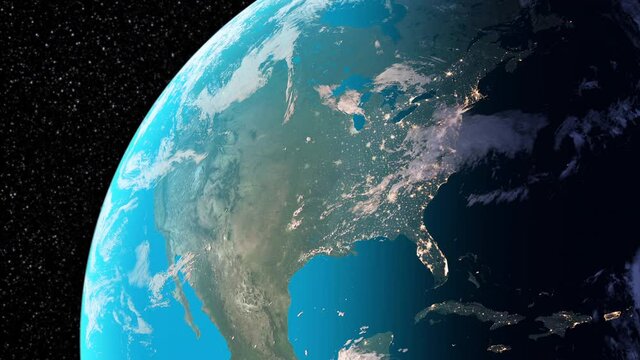 Magnificent satellite view of North America. A small approximation to the rotating Earth. It can be seen how the border of day and night is shifting from east to west.