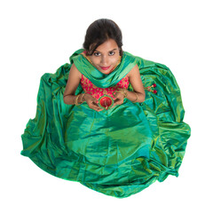 Portrait of a Indian Traditional Girl holding Diya, Girl Celebrating Diwali or Deepavali with...